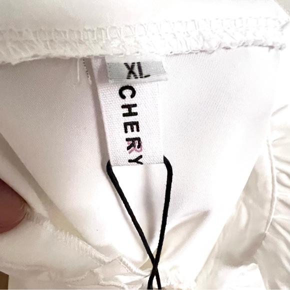 Women's White Ruffle Blouse - Picture 9 of 10